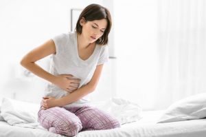 mujer dolor vagina cólicos